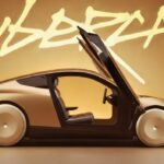 Vehículo taxi robot Tesla Cybercab con puertas de mariposa abiertas y letras 